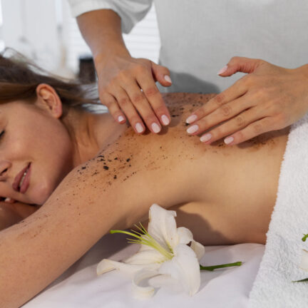woman-spending-time-spa-getting-exfoliation-massage